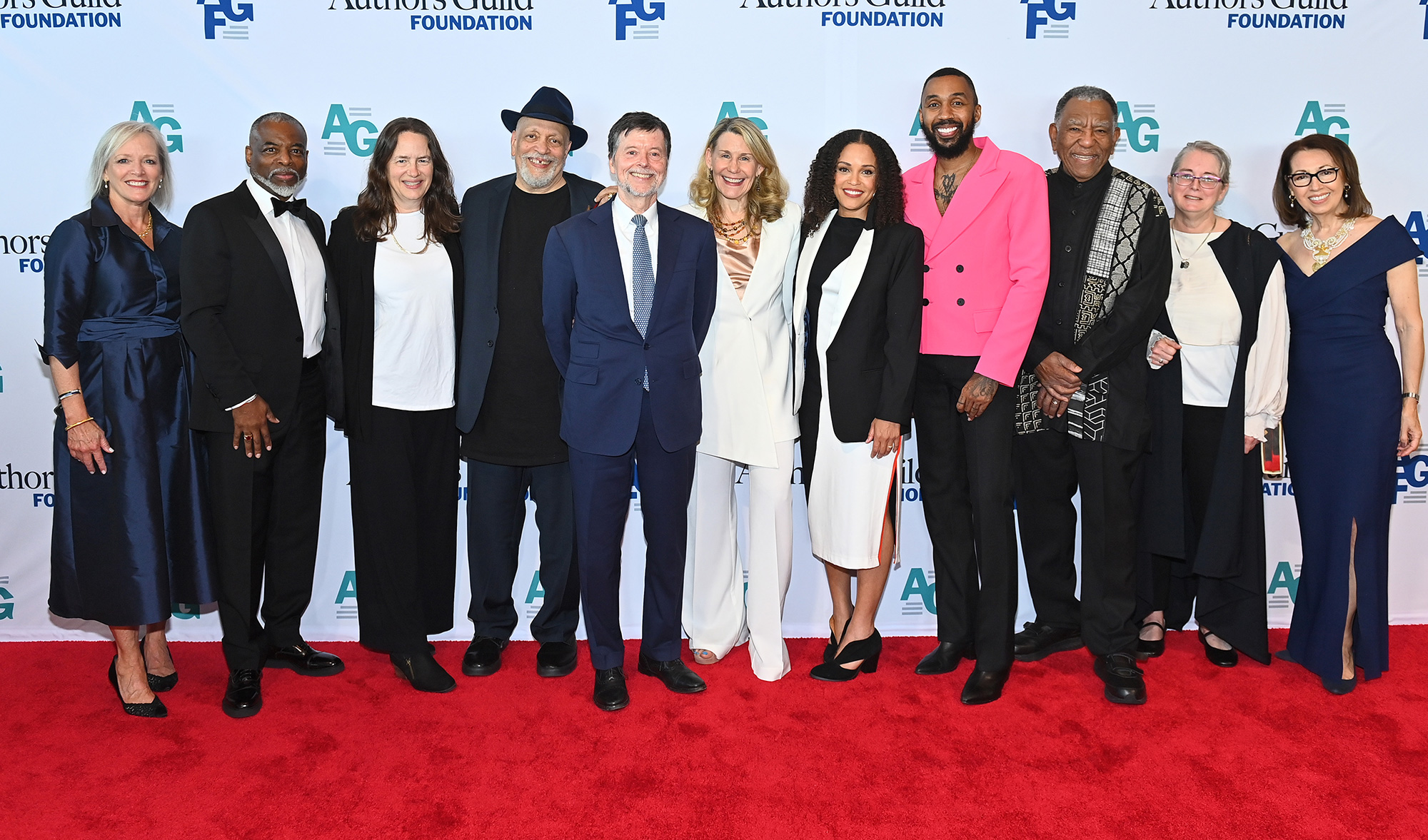 2024 Authors Guild Foundation Gala honorees and presenters pose on the red carpet with organizational leaders